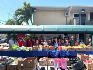 Volunteers working at a food distribution event.